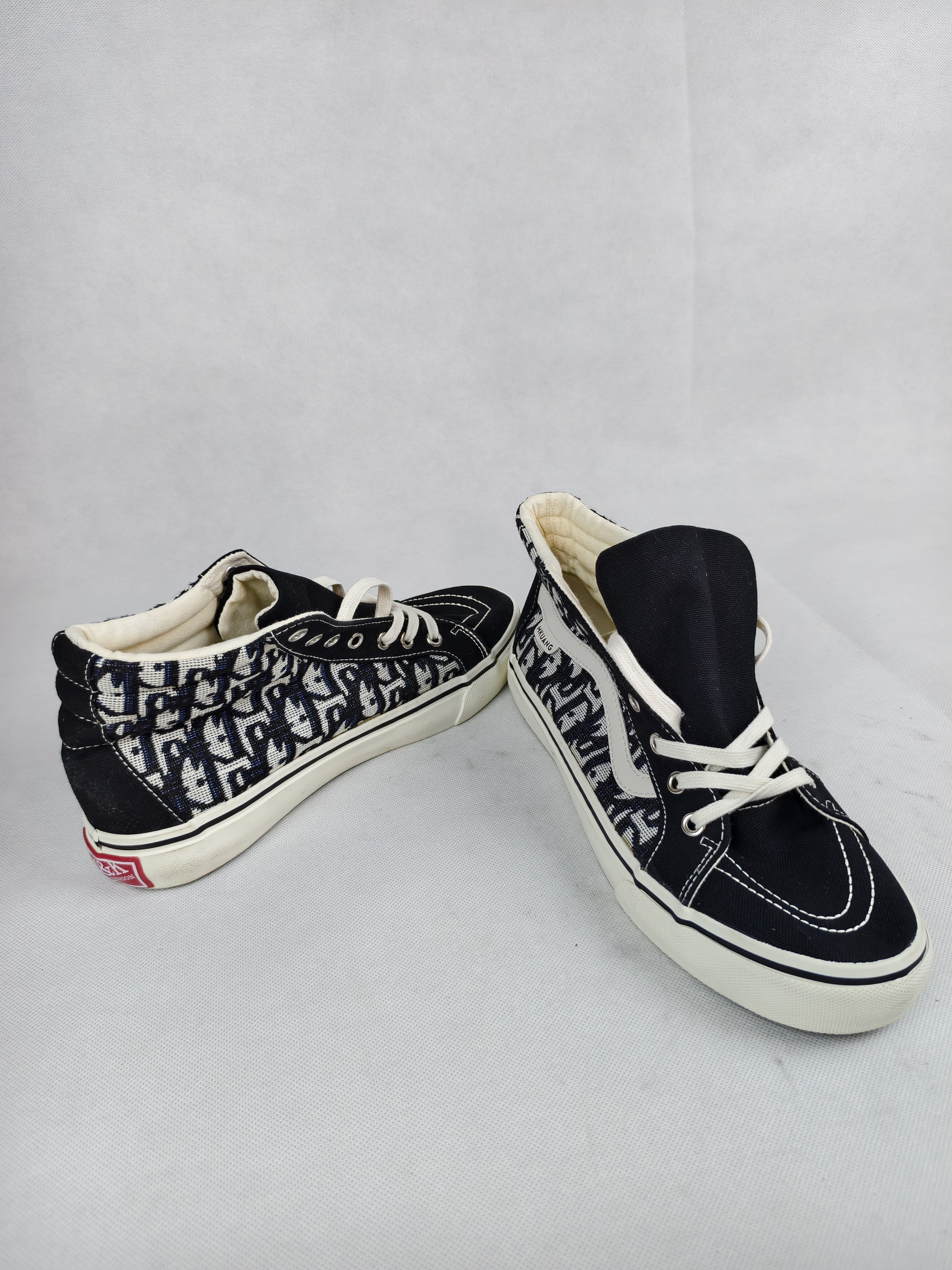 Stylish Black and White Sneakers — Pair photo